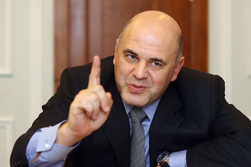 СМИ: Граждане не обязаны платить подоходный налог за перевод денег с карты на карту