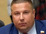 Из-за 